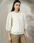 Women Cream Solid Round Neck 3/4th Sleeve Cotton Top