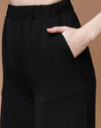 Women Black Mid Rise Plain Parallel Trousers