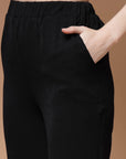 Women Black Mid Rise Plain Bootcut Trousers