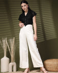 Cream Solid Regular Trousers Women Loose Fit High Rise Trousers